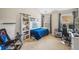 Cozy bedroom with a twin bed and gaming setup at 1428 Sparkling Cove Dr, Buford, GA 30518