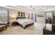 Large main bedroom with tray ceiling and sitting area at 1428 Sparkling Cove Dr, Buford, GA 30518