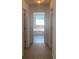 Bathroom with a view of the bathtub and hallway at 2118 Water Mill Ct, Buford, GA 30519