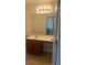 Double sink bathroom vanity with mirror and light at 2118 Water Mill Ct, Buford, GA 30519
