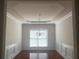 Bright dining room with hardwood floors and elegant chandelier at 2118 Water Mill Ct, Buford, GA 30519