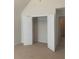 Spacious walk-in closet with double doors and hanging rod at 2118 Water Mill Ct, Buford, GA 30519