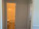 Clean bathroom with a toilet and shower/tub combo at 2118 Water Mill Ct, Buford, GA 30519