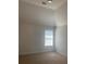 Well-lit bedroom with high ceilings and neutral decor at 2118 Water Mill Ct, Buford, GA 30519