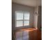 Bright breakfast nook with hardwood floors and window at 2118 Water Mill Ct, Buford, GA 30519