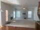 Bright living room with hardwood floors, fireplace and access to backyard at 2118 Water Mill Ct, Buford, GA 30519