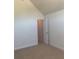 Spacious bedroom with an additional small room and neutral carpet at 2118 Water Mill Ct, Buford, GA 30519