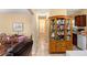 View of a kitchen with wood cabinets, stainless steel appliances, and tile floor at 1142 Pontiac Cir, Austell, GA 30168