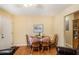 Dining area with wooden table and chairs at 1142 Pontiac Cir, Austell, GA 30168