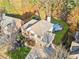 Stunning aerial view of house, pool, and surrounding landscape at 424 Lake Point Trce, Canton, GA 30114