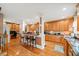 Well-equipped kitchen with ample cabinetry and hardwood floors at 424 Lake Point Trce, Canton, GA 30114