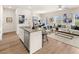 Open concept kitchen and living area with island and stainless steel appliances at 224 Epping St # 7, Stockbridge, GA 30281