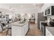 Eat-in kitchen with large island, stainless steel appliances and open to living room at 224 Epping St # 7, Stockbridge, GA 30281
