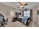 Bedroom featuring a full-size bed, ceiling fan, and window coverings at 1772 Brittany Chase Nw, Kennesaw, GA 30152