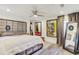 Spacious primary bedroom with plush bed, large mirror, and artwork at 1485 Ryan Sw St, Atlanta, GA 30310