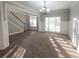 Spacious dining room with carpeted floor and natural light at 340 Bay Grove Rd, Loganville, GA 30052