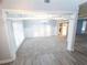 Bright dining room with white wainscoting and views to kitchen at 340 Bay Grove Rd, Loganville, GA 30052