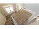 Two-story foyer with hardwood floors and views to the living room at 340 Bay Grove Rd, Loganville, GA 30052