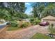 Backyard with detached garage and driveway at 1778 Campbellton Sw Rd, Atlanta, GA 30311