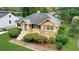 Cute yellow house with a manicured lawn at 1778 Campbellton Sw Rd, Atlanta, GA 30311