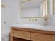 Modern bathroom with wood vanity and gold accents at 1778 Campbellton Sw Rd, Atlanta, GA 30311