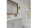 Modern bathroom with gold fixtures and marble vanity at 1778 Campbellton Sw Rd, Atlanta, GA 30311