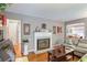 Bright living room featuring hardwood floors and a fireplace at 1778 Campbellton Sw Rd, Atlanta, GA 30311