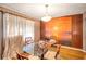 Dining room with glass table and sunset mural at 1778 Campbellton Sw Rd, Atlanta, GA 30311
