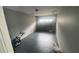 Attached garage with painted floor and overhead door at 2073 Marbut Ln, Lithonia, GA 30058