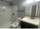 Updated bathroom with marble shower and vanity at 2073 Marbut Ln, Lithonia, GA 30058