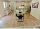 Kitchen dining area with glass table and four black chairs at 3479 Jasmine Way, Atlanta, GA 30331