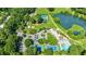 Aerial view of community amenities including tennis courts, pool, and clubhouse at 98 De Arc Nw, Atlanta, GA 30327