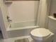 Simple bathroom with shower/tub combination and toilet at 98 De Arc Nw, Atlanta, GA 30327