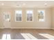 Living room with hardwood floors, neutral walls and lots of natural light at 701 Trevett Way, Marietta, GA 30062