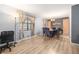 Dining room with hardwood floors and a dark wood dining table set at 3814 Lamar Way, Snellville, GA 30039