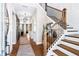 Bright and spacious entryway with staircase at 729 Keystone Dr, Woodstock, GA 30188