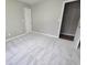 Spacious bedroom with neutral walls, carpet flooring and ample closet space at 2654 Calumet Farm Ln, Snellville, GA 30039