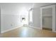 Spacious bedroom with wood-look flooring and a window at 4409 Shiloh Rd, Loganville, GA 30052