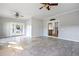 Bright sunroom with tile floors and French doors at 4409 Shiloh Rd, Loganville, GA 30052