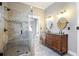 Updated bathroom with double vanity and walk-in shower at 4409 Shiloh Rd, Loganville, GA 30052