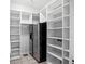 Large pantry with ample shelving for storage at 4409 Shiloh Rd, Loganville, GA 30052