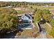 House with pool, surrounded by lush landscape at 4409 Shiloh Rd, Loganville, GA 30052