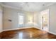 Spacious bedroom with hardwood floors and ceiling fan at 4409 Shiloh Rd, Loganville, GA 30052
