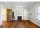 Bright bedroom with hardwood floors and a fireplace at 4409 Shiloh Rd, Loganville, GA 30052