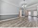 Bright dining room with hardwood floors and neutral colors at 8615 Amsbury Way, Cumming, GA 30041