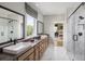 Spa-like bathroom with double sinks, large shower, and marble flooring at 5063 Baywood Ln, Woodstock, GA 30188