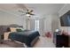 Large main bedroom with ceiling fan and plush carpet at 4131 High Park Terrace, Atlanta, GA 30344