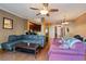 Spacious living room featuring hardwood floors and a comfortable sectional sofa at 4131 High Park Terrace, Atlanta, GA 30344
