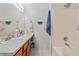 Clean bathroom with vanity, shower, and tub at 4131 High Park Terrace, Atlanta, GA 30344