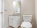 Small bathroom with toilet and vanity at 65 Somersby Ln, Hiram, GA 30141